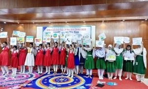 We’re all winners today! Children showing off their colorful paintingts with pride.